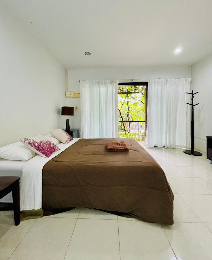Wassana Sitdharma Guesthouse Trang Bagian luar foto