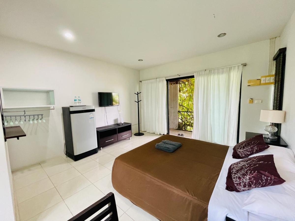 Wassana Sitdharma Guesthouse Trang Bagian luar foto